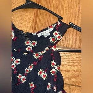 Francesca’s XS Black Romper with Floral Pattern